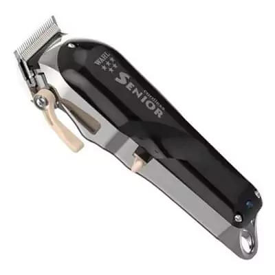 Máquina de cortar cabelo profissional Wahl Senior, com frente preta, traseira em metal brilhante e alavanca dourada.
